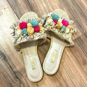 Women’s pompom shoes. Perfect for summer or beach.